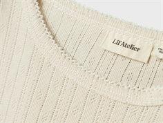 Lil Atelier turtledove top